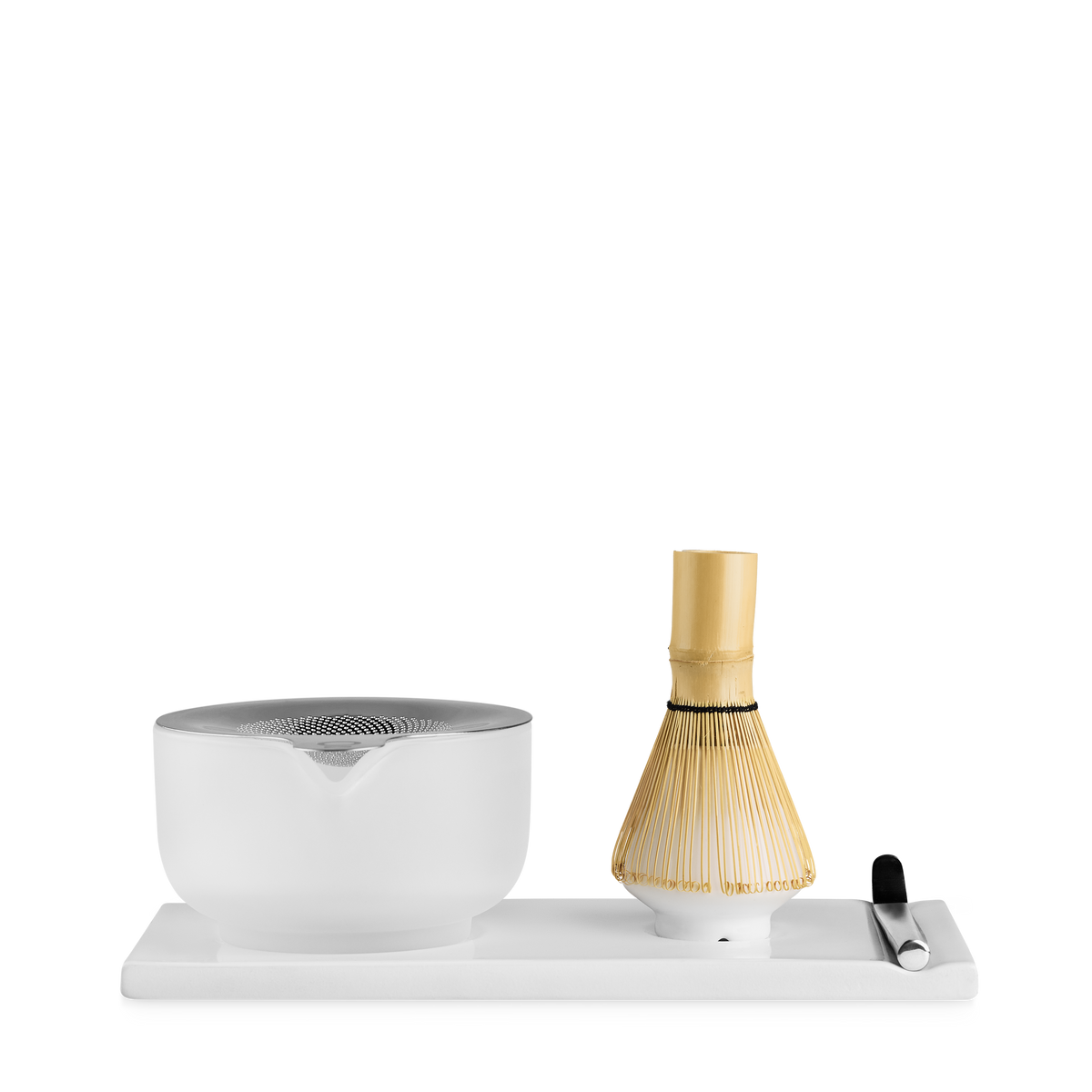 The Fellow Matcha Set in Matte White includes a bamboo whisk, spoon, tray, and ceramic bowl.