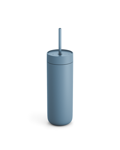 The Fellow Carter Cold Tumbler is blue and comes with a lid and straw.