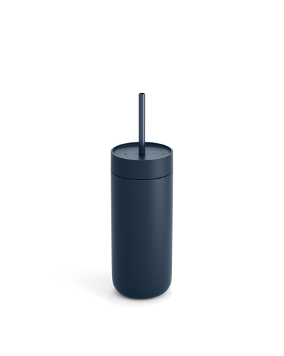 Fellow Carter Cold Tumbler in dark blue with lid and straw on a plain white background.