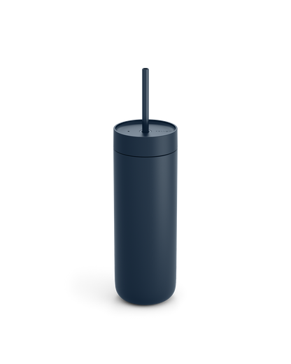 Fellow Carter Cold Tumbler in dark blue with lid and straw on a plain white background.