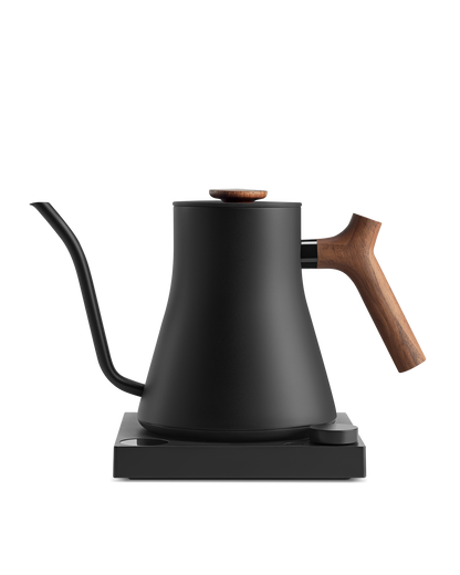Fellow Stagg EKG electric kettle: fast heating, black finish, wooden handle, matching base.